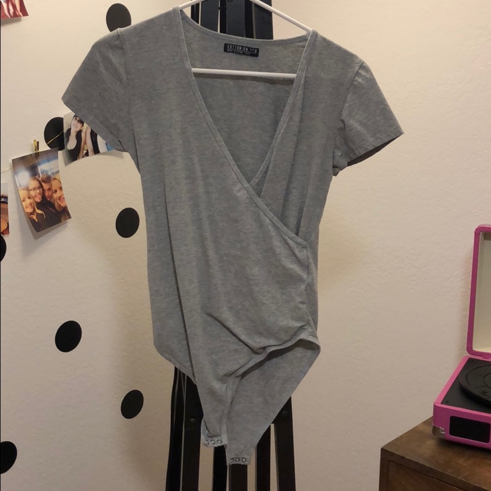 Grey v neck body suit